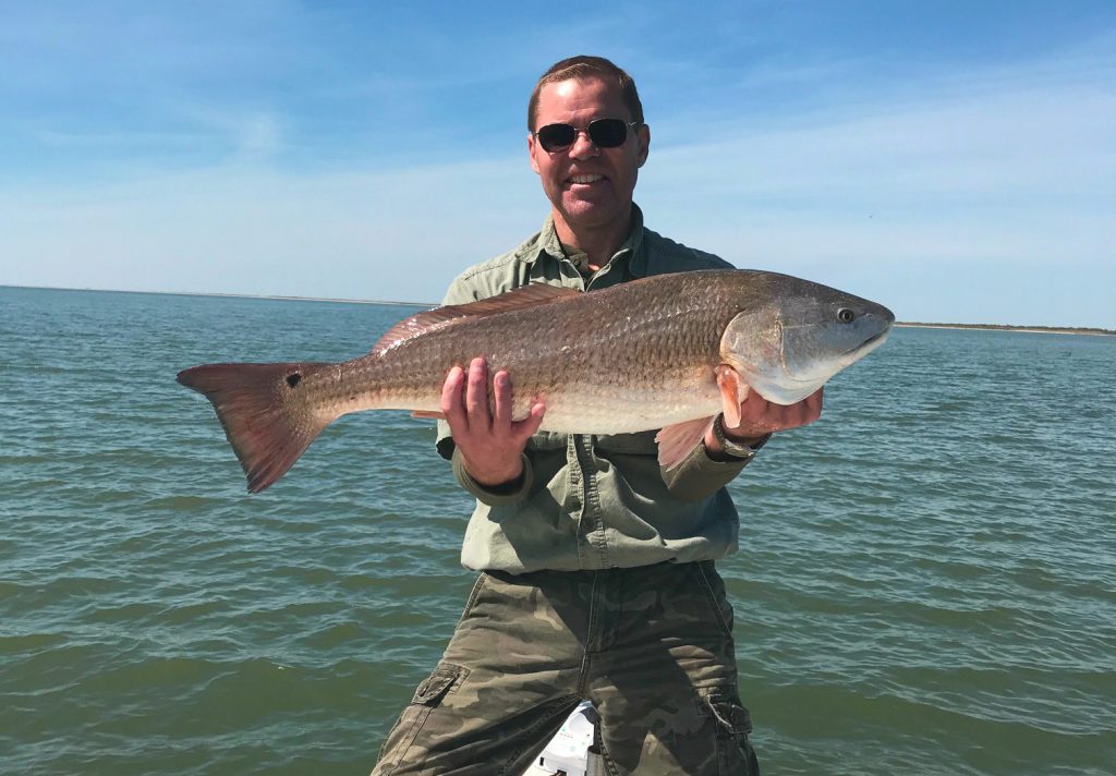 Paul Hale holding Redfish on Lake Calcasieu, LA