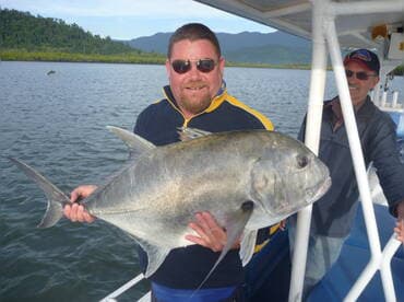 Fishing Guide `Darryl` always on hand to help a Giant Trevally.