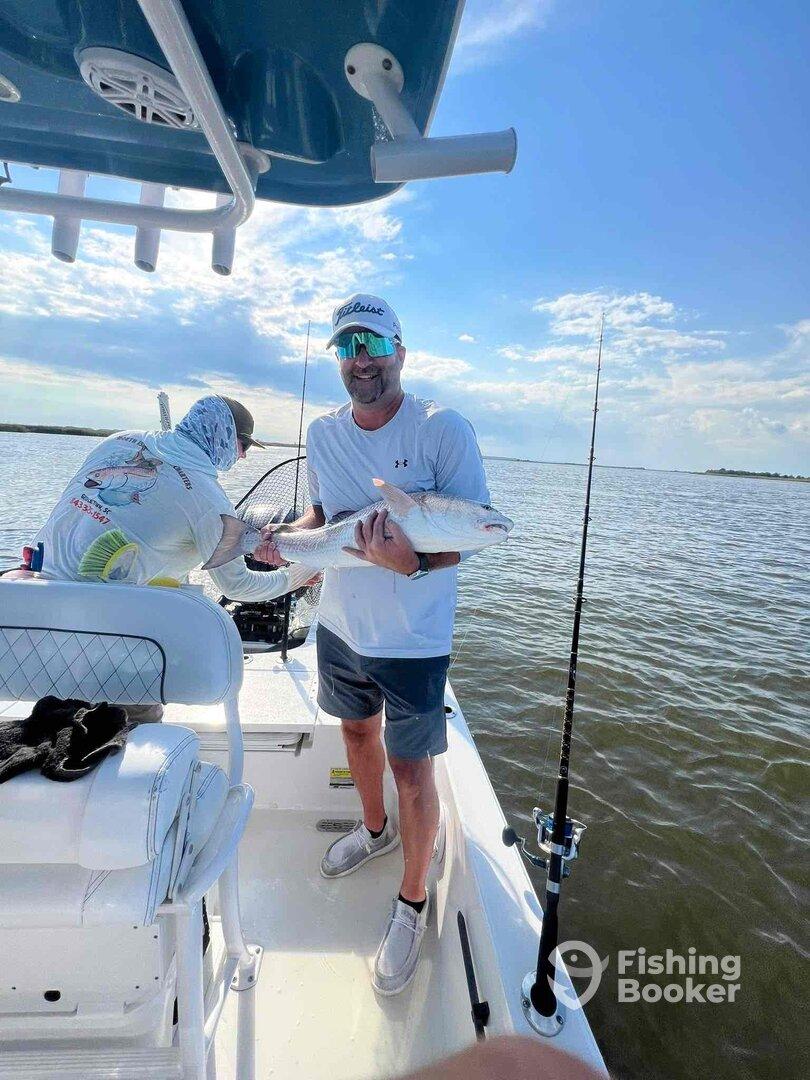 Great afternoon landing redfish!