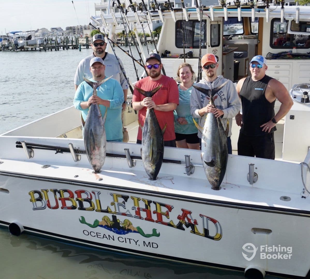 A group of anglers proudly displaying their catch of large Yellowfin Tuna aboard the 'Bubble Head' in Ocean City, MD.