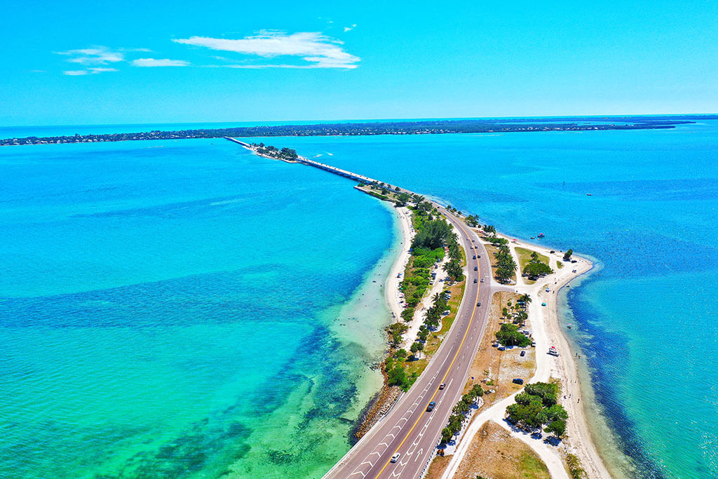 An aerial view across the water to Sanibel Island, FL