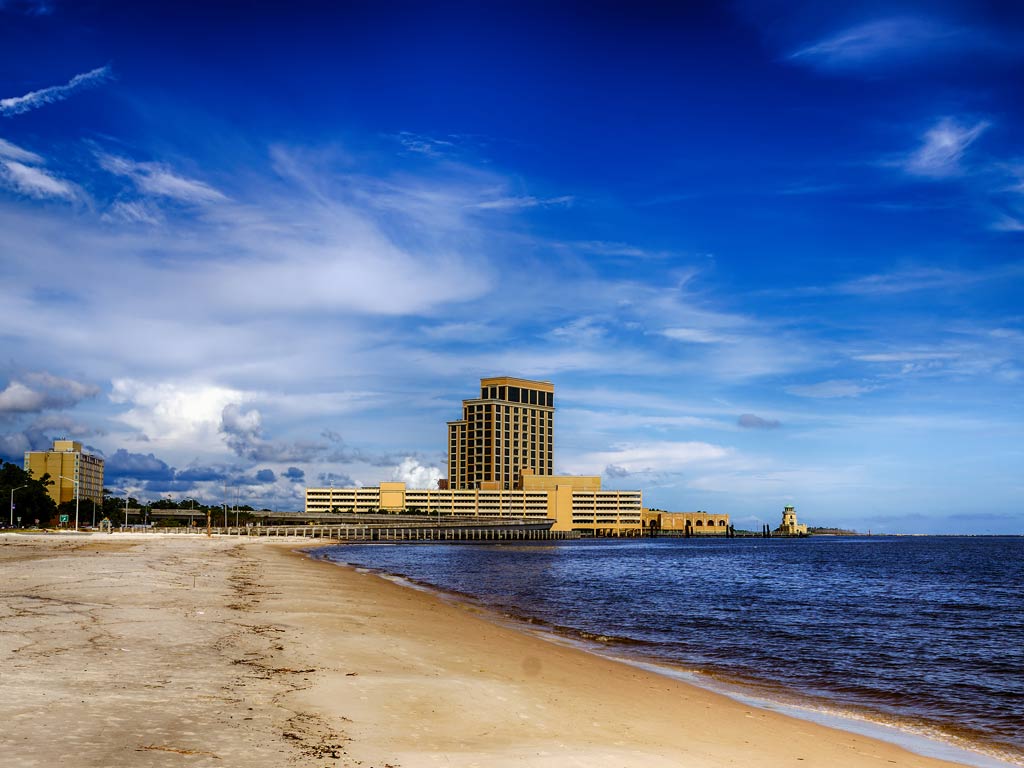 A shot of the Mississippi Gulf Coast, taken from a beach with Biloxi casinos and buildings in the background.