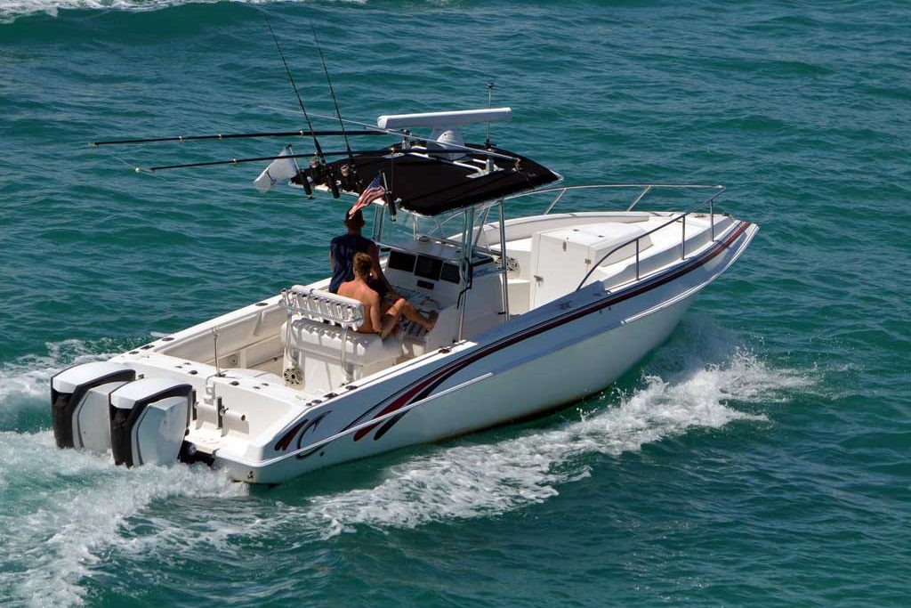 A center console boat riding through the water.