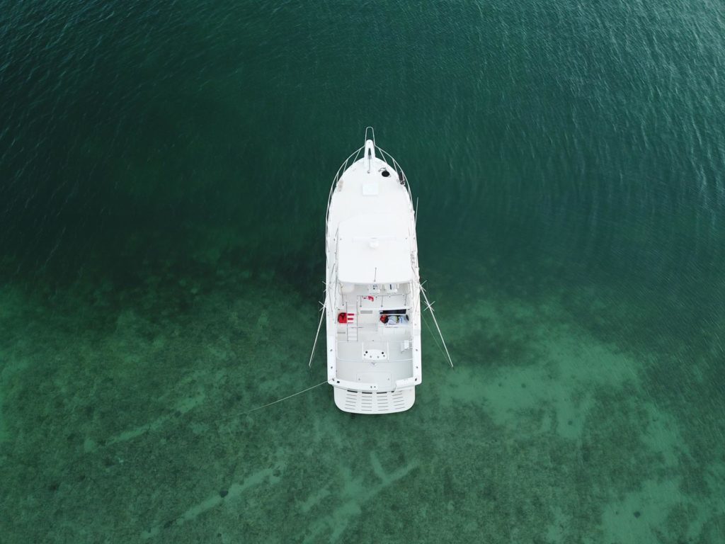 An aerial view of a boat that is operated by Infinity Private Charters in the Cayman Islands.