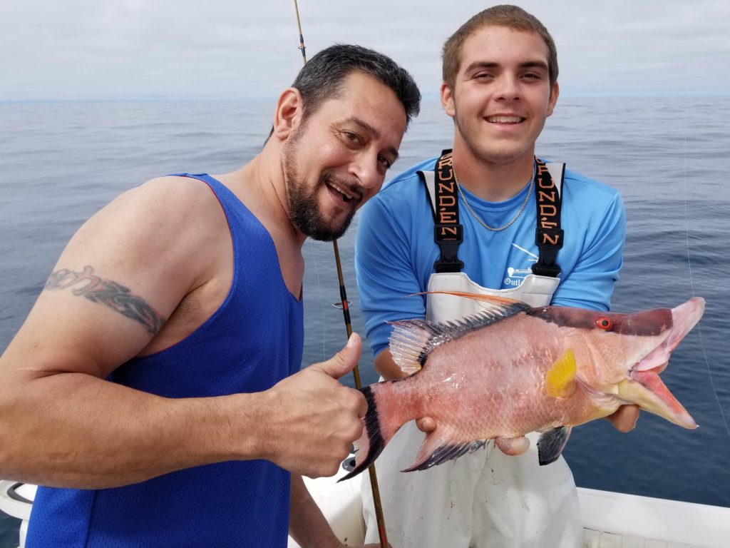 Two anglers in Clearwater with freshly caught Hogfish