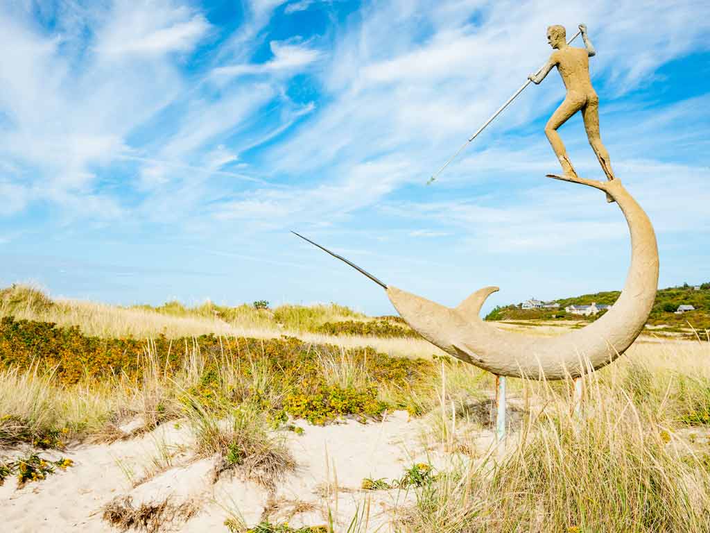 A photo of the Swordfish Harpooner sculpture at Menemsha Beach on Martha's Vineyard