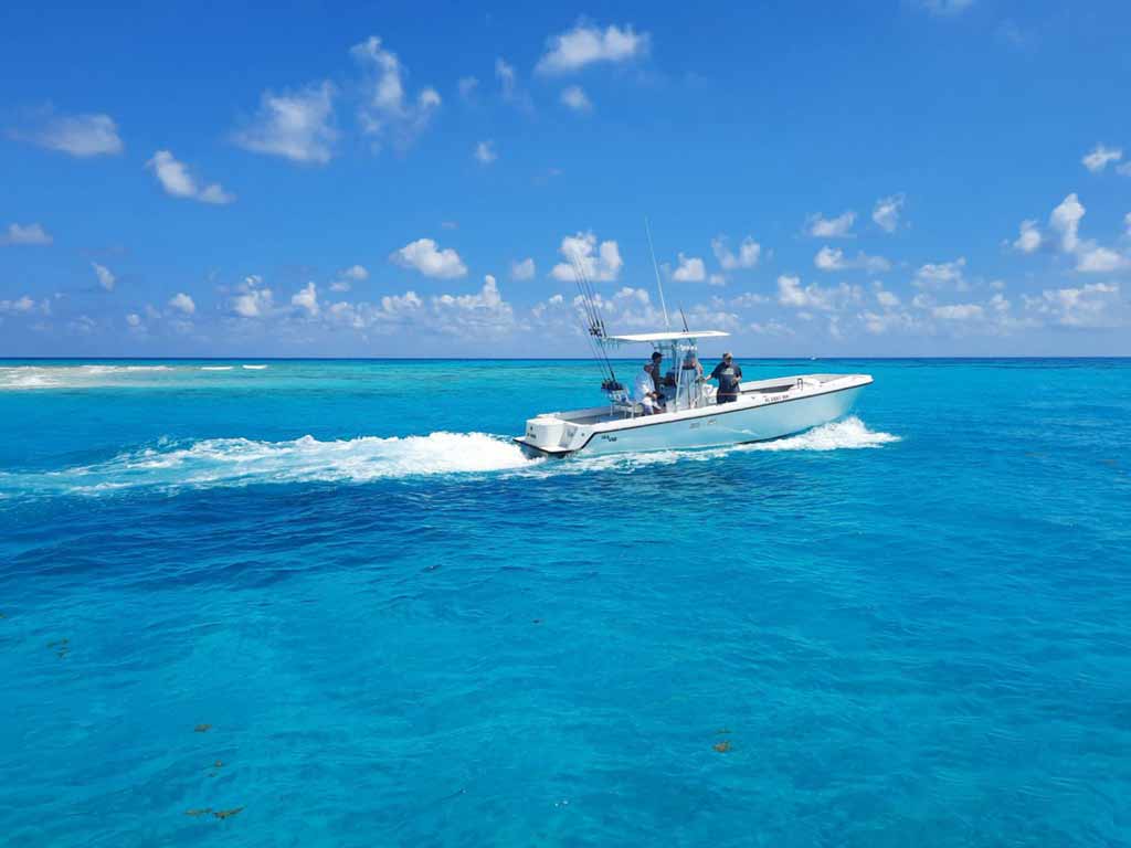 A view of an Islamorada charter fishing boat gliding through the turquoise water