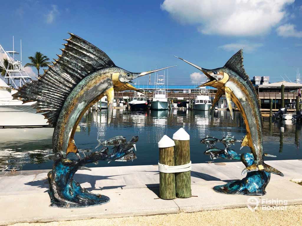 A photo of two Sailfish statues in Whale Harbor Marina in Islamorada