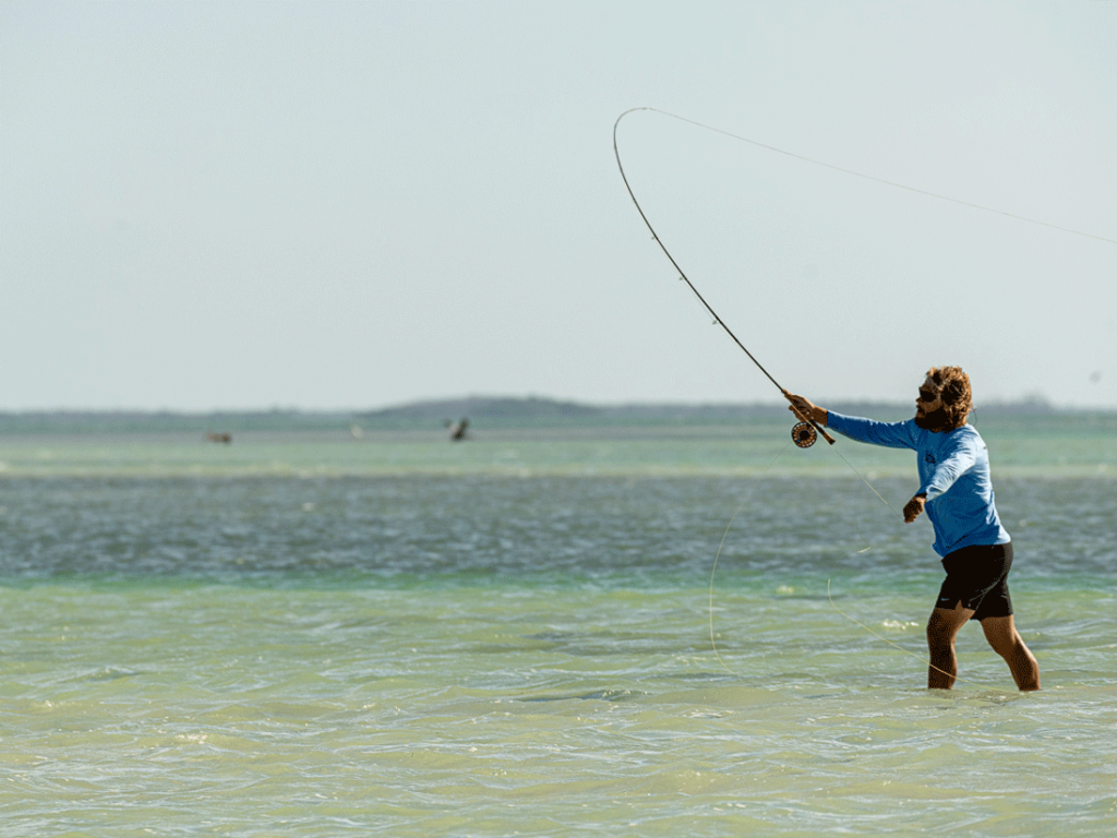 An angler making his cast in the flats of the Florida Keys.