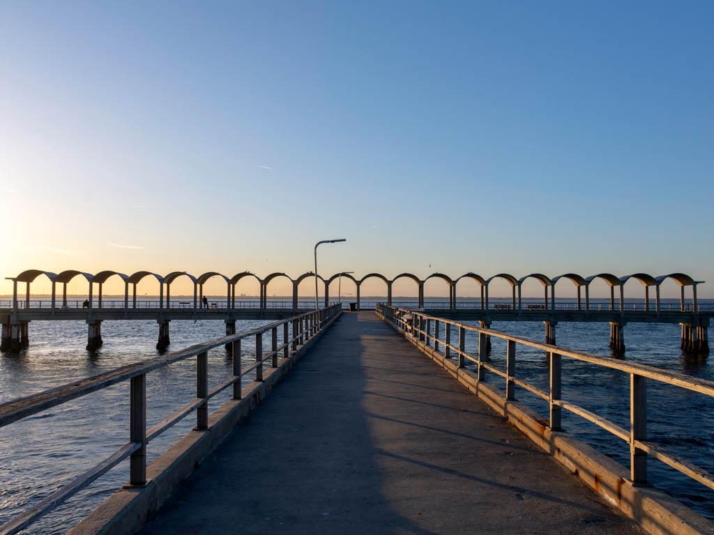 A beautiful sunset view of a crowd-free Jekyll Island Fishing Pier