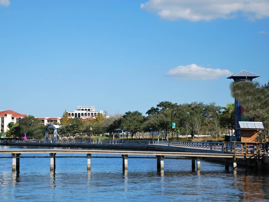 A side view of a bridge on the Manatee River and one of the several fishing piers in Bradenton