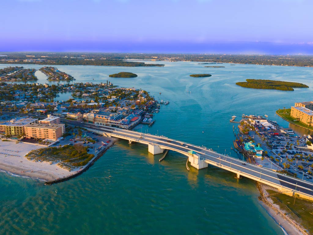 An aerial view of John’s Pass in Madeira Beach just after sunset