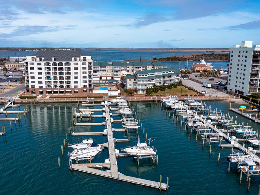 An aerial view of a dock area in Morehead City with parked boats shown.