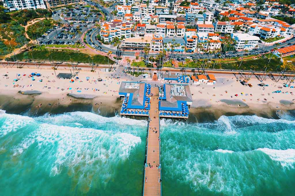 An aerial view of a pier and beach on San Clemente Island