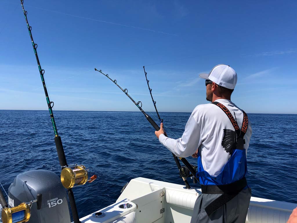 A photo of an angler fishing aboard a Delaware charter boats.