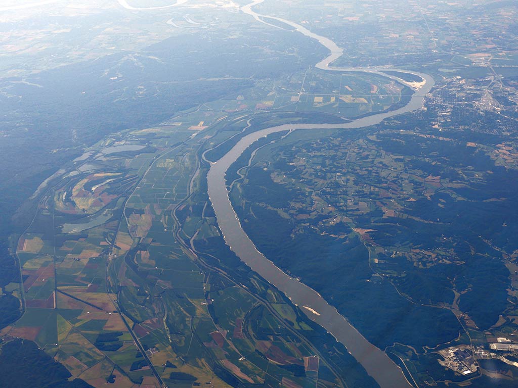 An aerial view of the Mississippi River winding along the Louisiana border