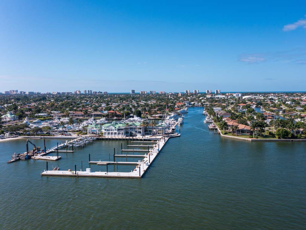 An aerial photo of the marina in Marco Island, Florida on a sunny day.