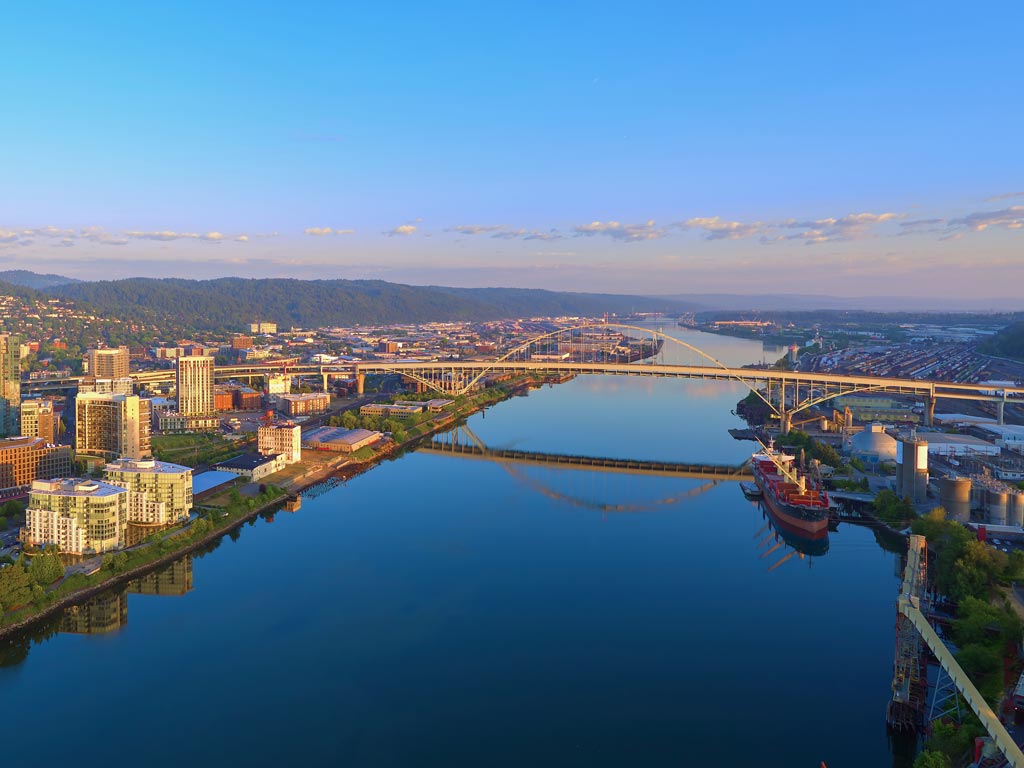 A photo of the Willamette River in Portland, Oregon, with the Fremont Bridge visible.