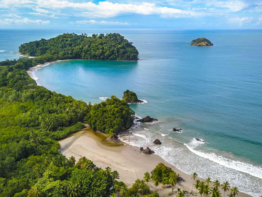 An aerial view of a beach and the Pacific Ocean near Quepos in Costa Rica.