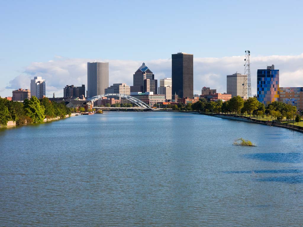 A skyline view of Rochester, New York and the Genesee River.