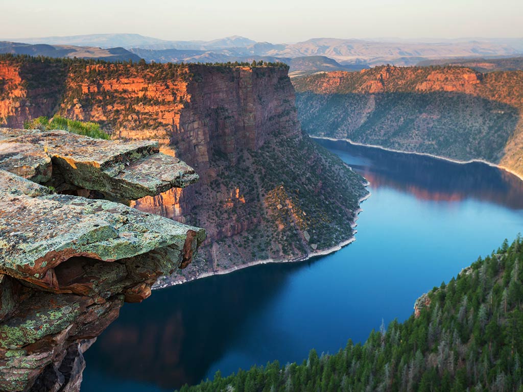 A view from the summit above Flaming Gorge Reservoir, showing the canyon and impressive drop offs above the winding waterway