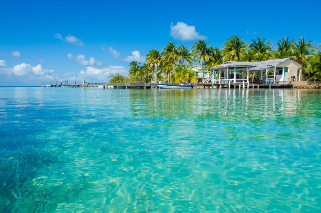 A boat docked at a pierce in Ambergris Caye, Belize
