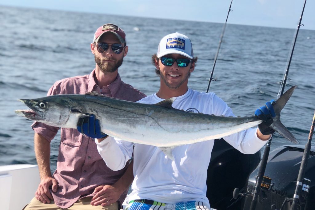 Two anglers posing with a big King Mackerel