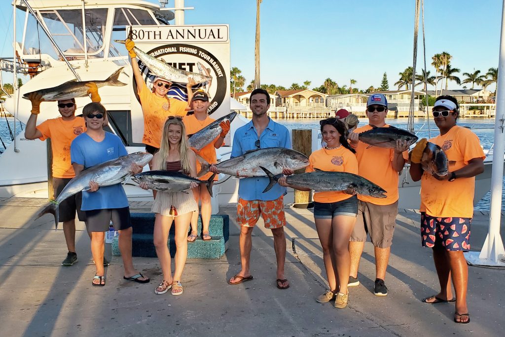A group of anglers posing with the fish they caught at the South Padre International Fishing Tournament