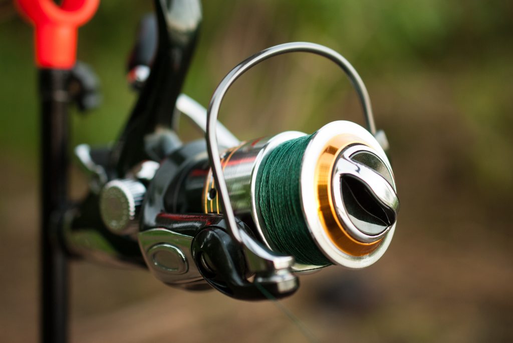 a closeup of a reel with a braided fishing line