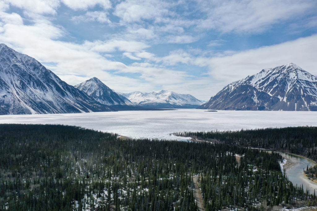 An aerial view of the Kathleen Lake, one of the best ice fishing destinations in Canada. Kathleen river in the right down corner of the image. Mountains and forest also seen on the image