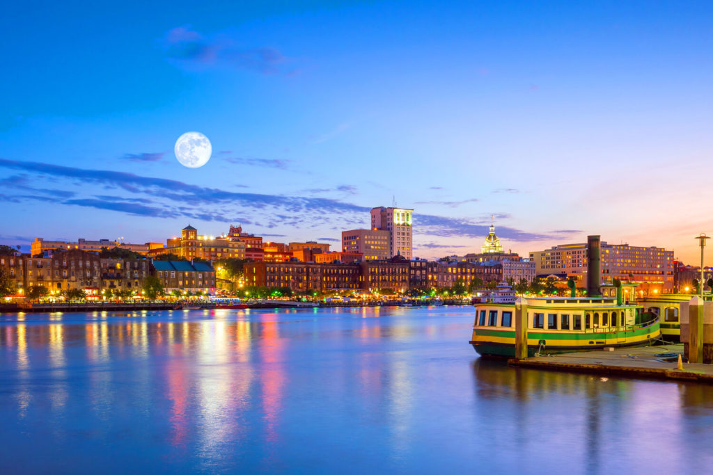 a sunset skyline of Savannah, Georgia