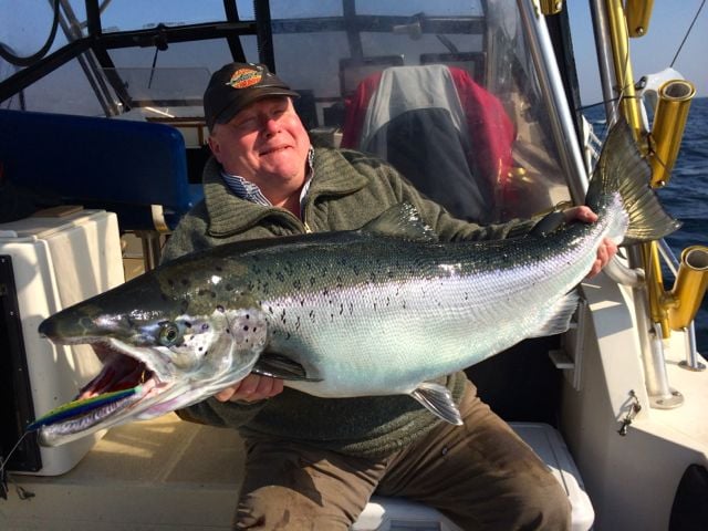 Atlantic Salmon Fly - First catch on dry fly fishing in Norway